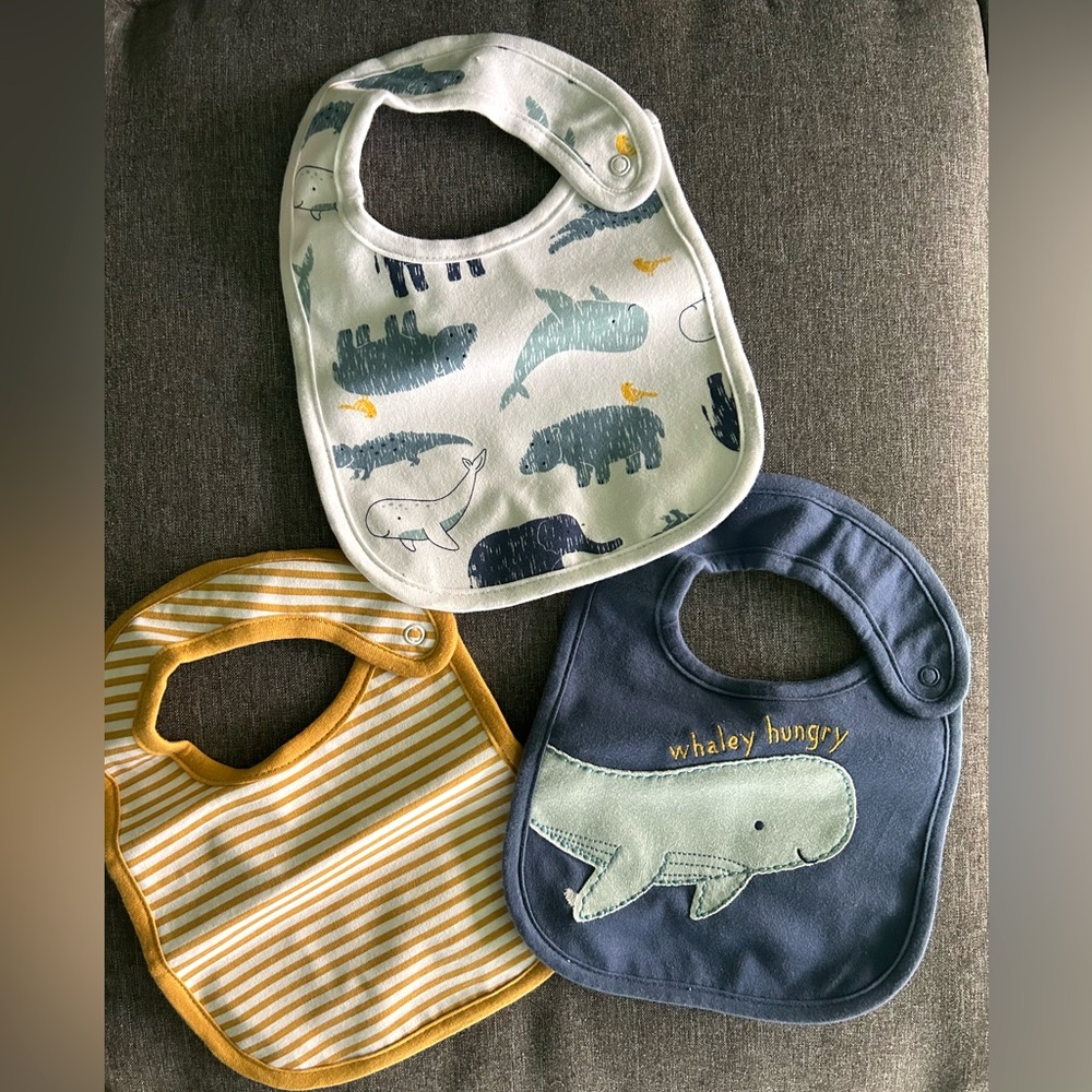 NWOT baby bibs. Never used! Carters brand baby bibs, pack of 3.